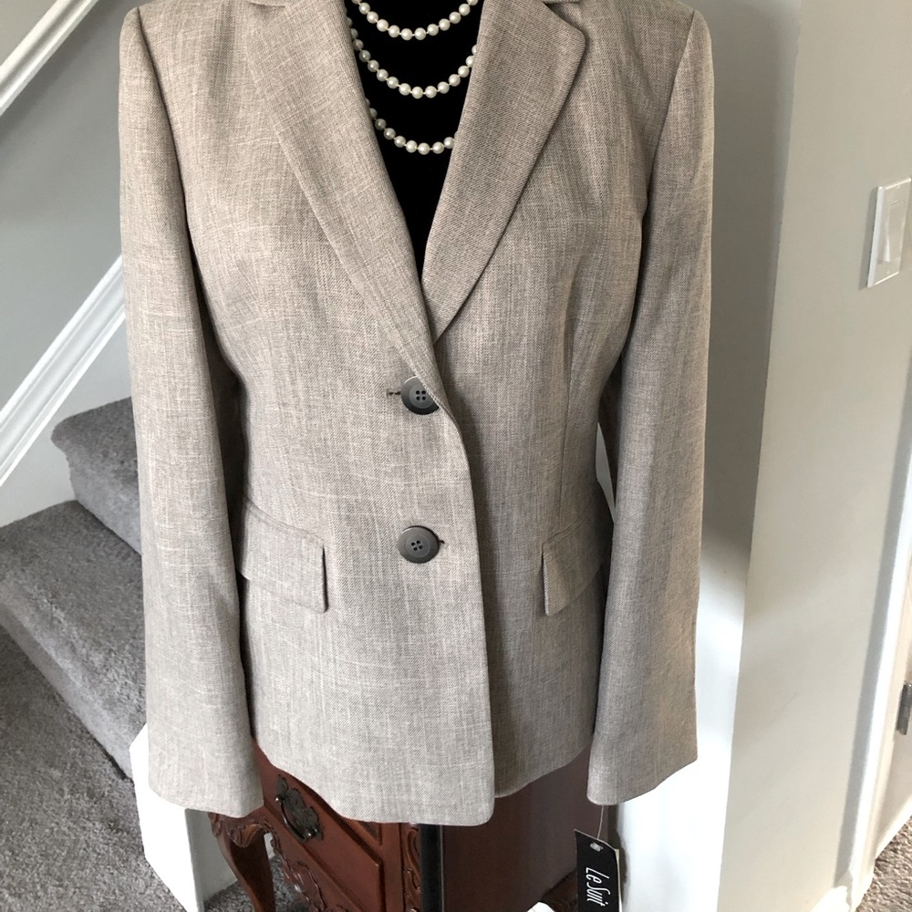 Gray pants suit.